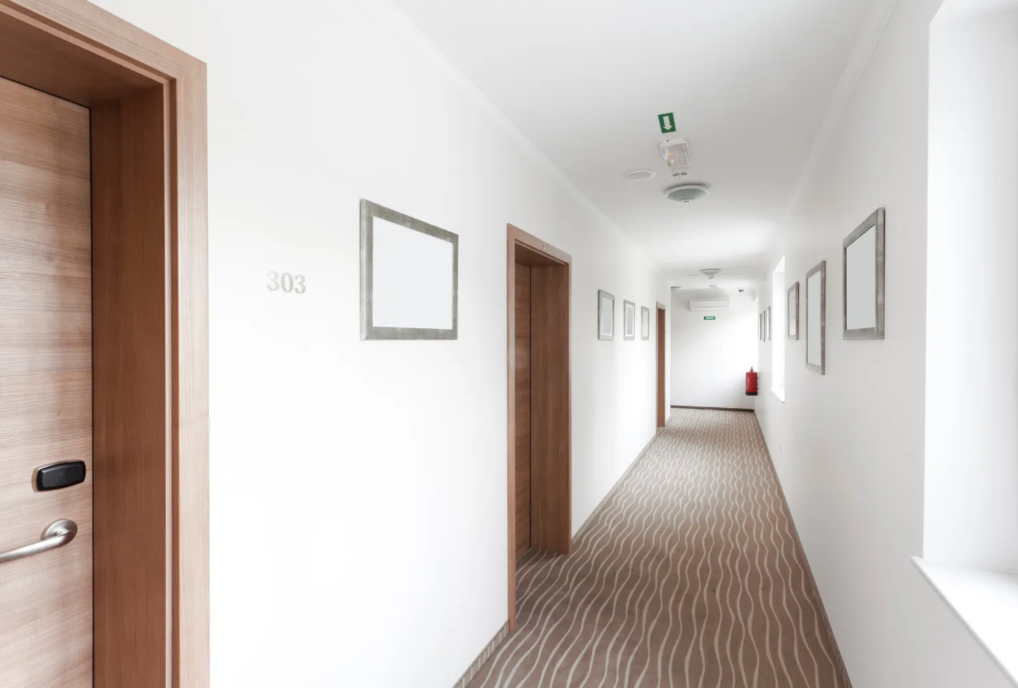 HOA interior hallway painting project with clean white walls and modern finishes by Best Painting LA