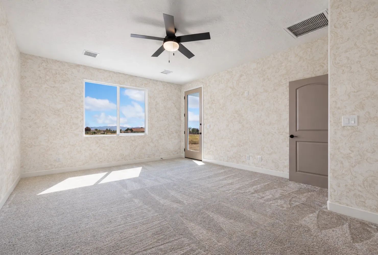 Wallpaper installation project in a residential entryway with patterned walls by Best Painting LA in Los Angeles, CA